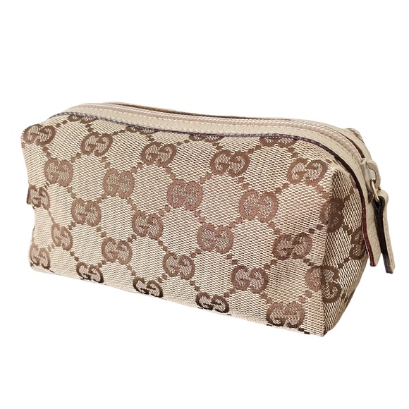 Gucci Handbags - ❤️SOLD❤️Gucci NWOT brown monogram canvas and leather small cosmetic zip pouch